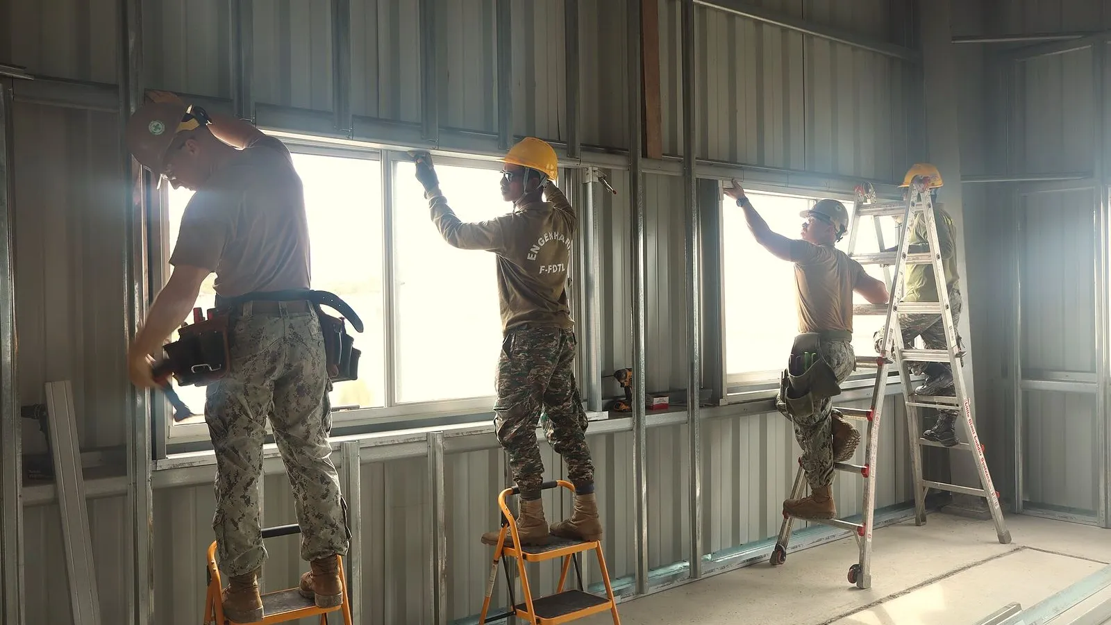 Steel wall framing going up inside a building